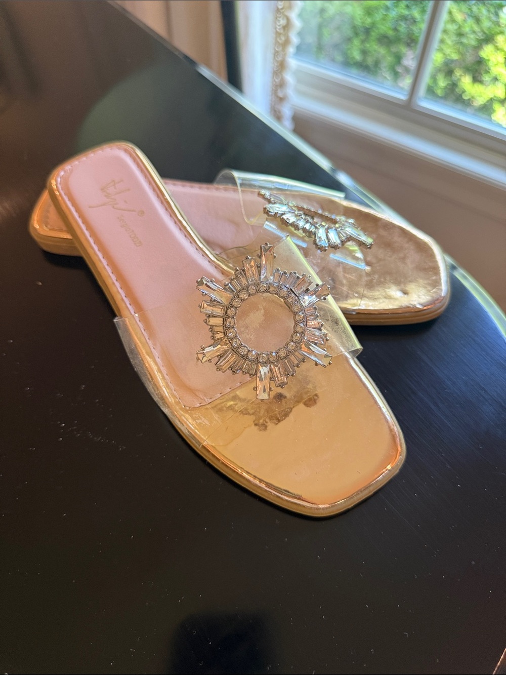 Women’s Clear Slide Sandals with Gold Accent and Crystal Medallion